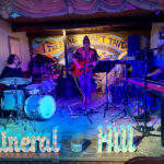 Three members of Mineral Hill band performing at the Mine Shaft Tavern in Madrid, New Mexico