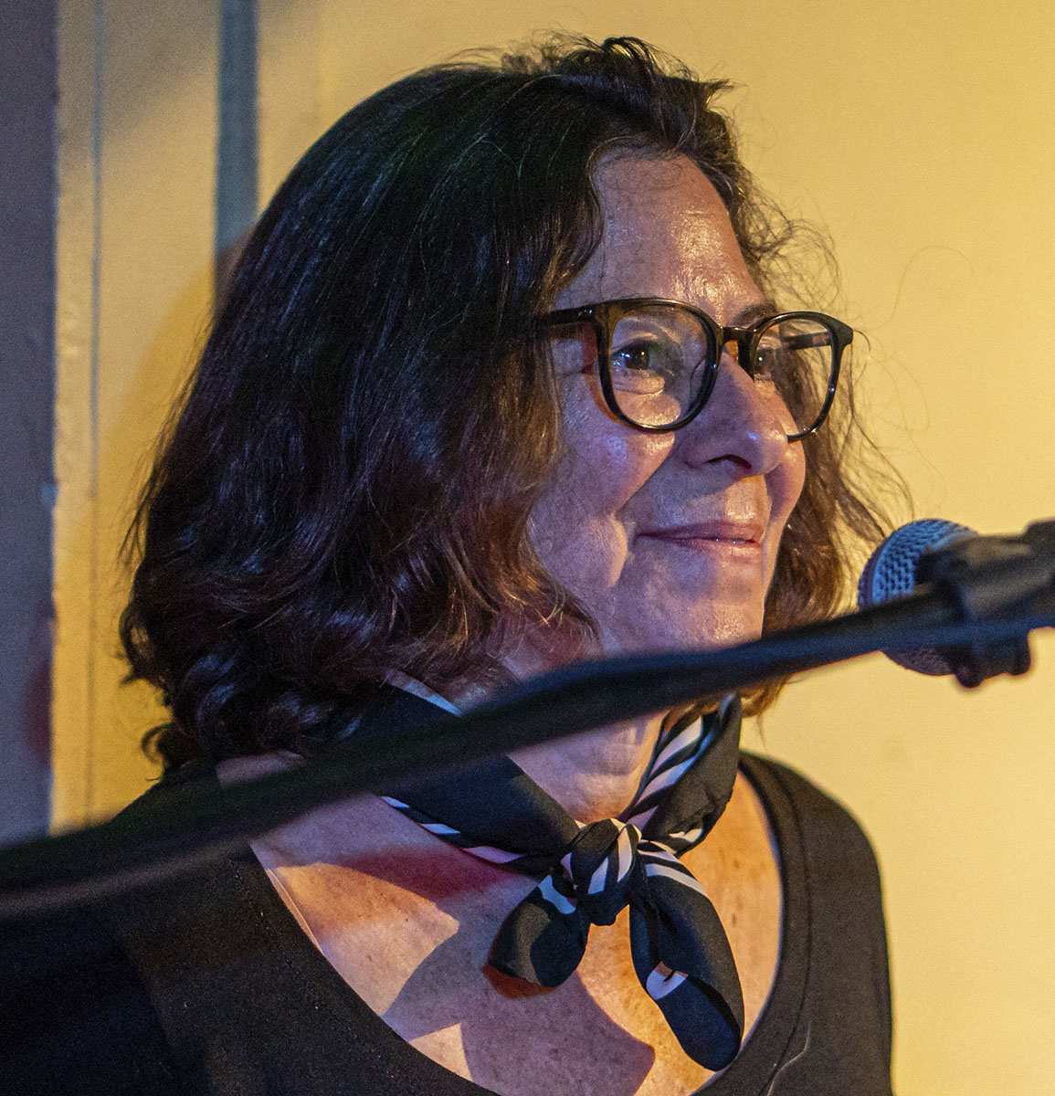 Portrait of Lauren Addario at the drums. Photo by Bud Ingraham